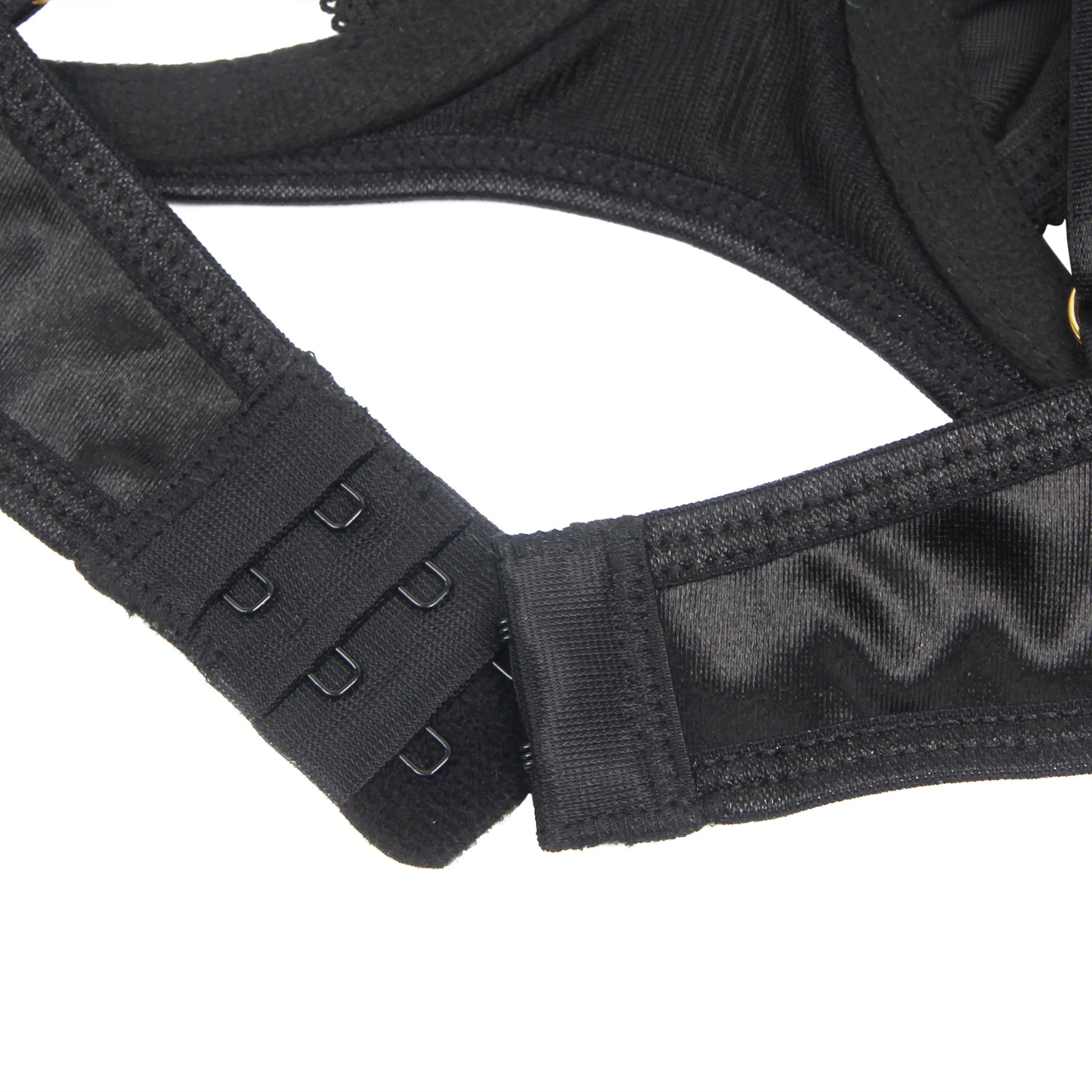 black lingerie adjustable strap with gold clip fastening detail